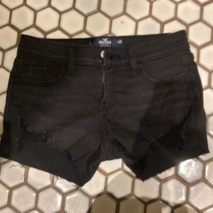 Black low rise ripped jean shorts
